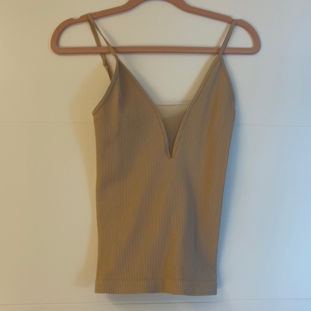 Cute stretchy light pink/tan top from free people